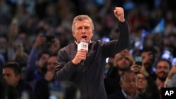 Argentina's President Mauricio Macri works the crowd during a campaign rally in Cordoba, Argentina, Aug. 7, 2019.