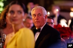 Rex Tillerson, President-elect Donald Trump's choice for secretary of state, attends the presidential inaugural Chairman's Global Dinner in Washington, Jan. 17, 2017.