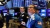 Stocks Sink, Bonds Soar on Fears Virus Will Stunt Economy