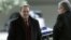 Russia's Deputy Foreign Minister Mikhail Bogdanov (L) arrives at the United Nations European headquarters in Geneva January 11, 2013.