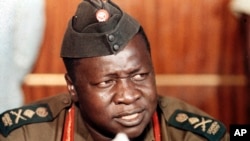 FILE — Ugandan President Idi Amin speaks at a news conference during a visit to Damsacus, Syria, on Oct. 16, 1973.