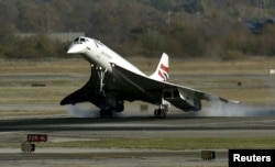 A British Airways Concorde supersonic jet makes it's final landing at New York's John F. Kennedy International Airport as it arrives from London's Heathrow Airport, Nov. 10, 2003.