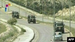 Сирійські військові автомобілі на шляху з міста Дара