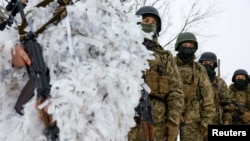 Ukrajinski vojnici na vježbi u regionu Kijeva. (Foto: REUTERS/Valentyn Ogirenko)