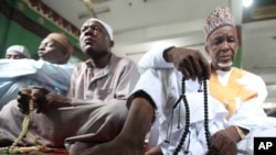 Nigeria Muslims offer prayers during Eid al-Adha which marks the end of the holy month of Hajji in Lagos, Nigeria, Oct. 15, 2013.