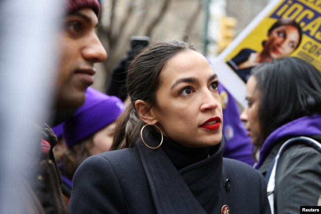 FILE - Rep. Alexandria Ocasio-Cortez (D-NY) speaks during a march in the Manhattan borough of New York City, Jan. 19, 2019.