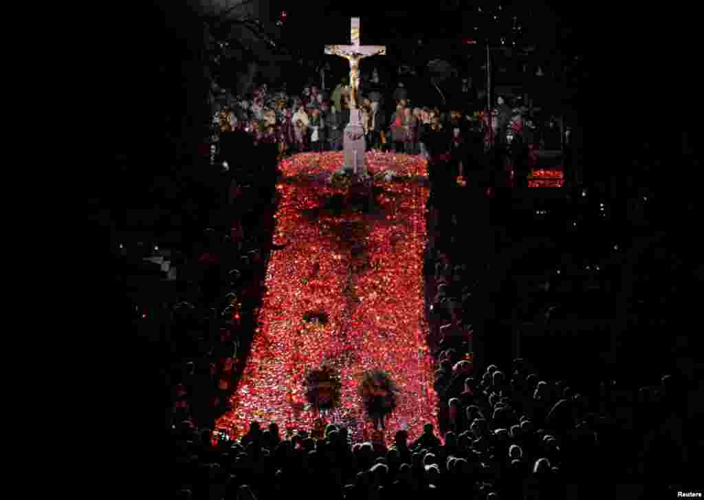 People light candles during All Saints Day at Mirogoj cemetery in Zagreb, Croatia.