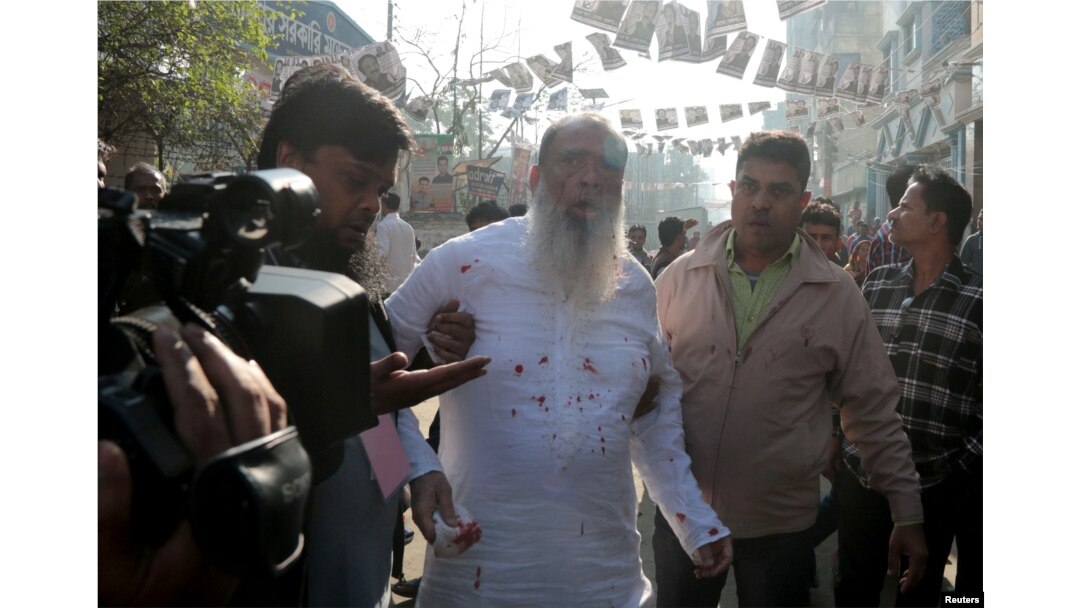Salahuddin Ahmed, a Bangladesh Nationalist Party (BNP) candidate for general election, is seen bleeding as he was stabbed on a election day in Dhaka, Dec. 30, 2018.