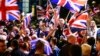 Pro-union protestors chant and wave Union Flags during a demonstration at George Square in Glasgow, Scotland, Sept. 19, 2014.