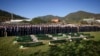 Imams and mourners attend the collective funeral for 19 victims of a landslide caused by recent floods in Jablanica, Bosnia, Oct. 15, 2024.