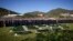 Imams and mourners attend the collective funeral for 19 victims of a landslide caused by recent floods in Jablanica, Bosnia, Oct. 15, 2024.