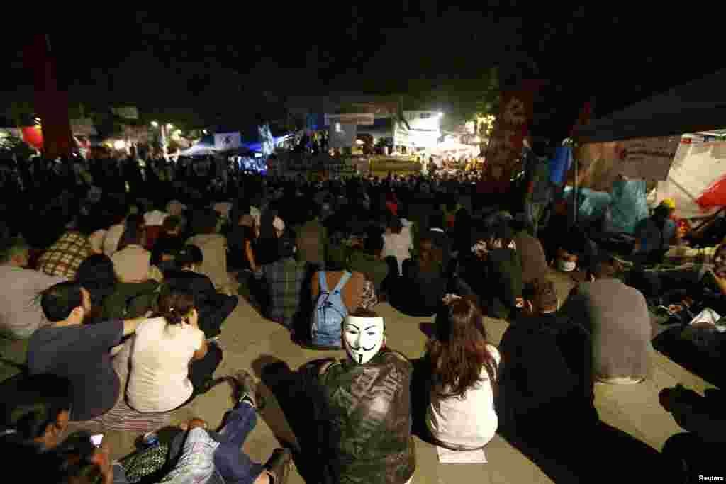 Protesters watch a film in Gezi Park in Istanbul, June 14, 2013.
