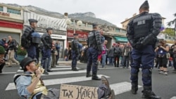 An anti-G20 demonstrator at the France-Monaco border on Thursday