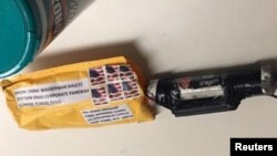 A package containing a "live explosive device," according to police, received at the Time Warner Center, which houses the CNN New York bureau, is shown in this handout picture provided Oct. 24, 2018.