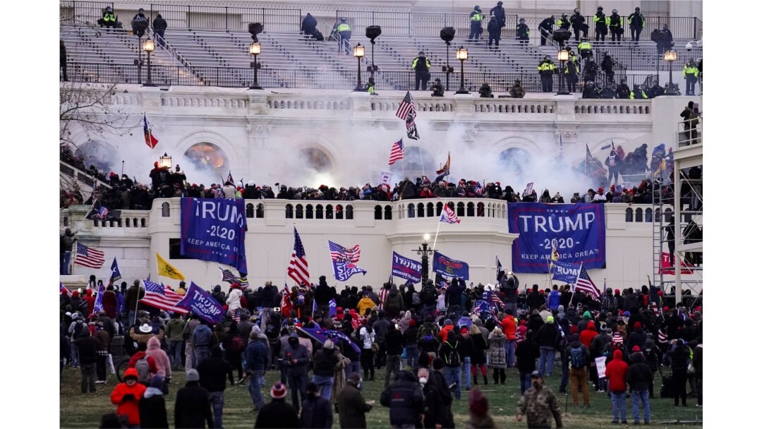 In this Jan. 6, 2021, file photo, rioters storm the Capitol, in Washington. Capitol Police say they have intelligence showing a “possible plot” by a militia group to breach the U.S. Capitol.