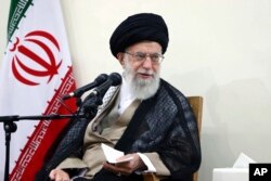 In this picture released by an official website of the office of the Iranian supreme leader, Supreme Leader Ayatollah Ali Khamenei attends a meeting with judiciary officials, in Tehran, Iran, June 27, 2018.