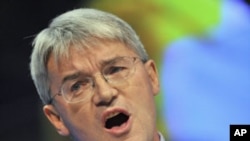 Britain's Secretary of State for International Development Andrew Mitchell addresses the Conservative Party's annual Conference in Manchester, England, October 2011. (file photo)