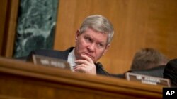 FILE - Senate Banking Committee Chairman Sen. Tim Johnson (D-SD) on Capitol Hill in Washington, May 21, 2013.