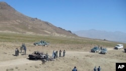 FILE- The scene of an attack is seen in Afghanistan's Paktia province, June 24, 2008.