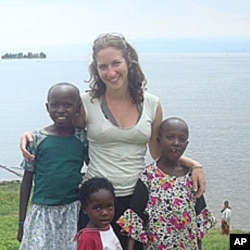 Peace Corps volunteers like Sonia Morhange, seen here in Rwanda, can exchange project information and success stories quickly over the phone and the Web.