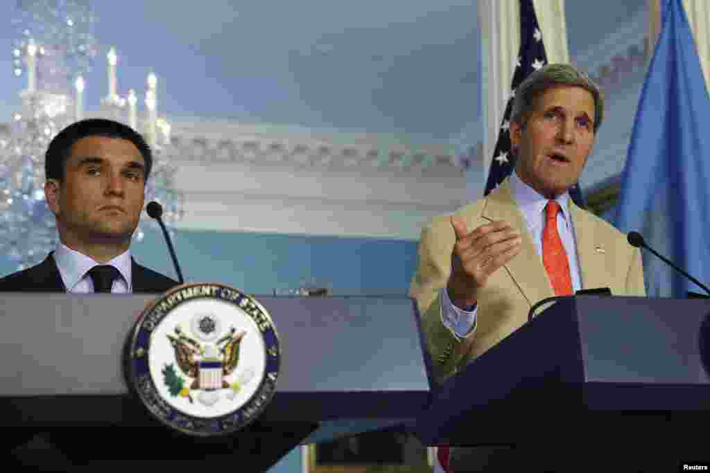 U.S. Secretary of State John Kerry (right) and Ukraine Foreign Minister Pavlo Klimkin hold a news conference at the State Department, in Washington, July 29, 2014.