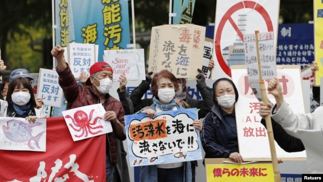 People rally to protest against the Japanese government's decision to discharge contaminated radioactive wastewater from Fukushima Daiichi nuclear power plant into the sea, in front of the Fukushima prefectural government headquarters in Fukushima, on Apr