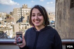 Farha Nader, a politics researcher, shows a paper heart bearing her name. It was a gift from her friend, Gamal Abdulhakim, who made it for her while in custody. "In the early days of Gamal’s detention, it was super cool," she said, "He was able to video call me for hours from his cell. He used to remind me when to take my medications." But that changed when prison authorities transferred him to Burjj Al-Arab prison last October, where conditions are harsher. "Now no one can visit him but his close family, and any message I want to deliver to him is through the lawyer,” Nader said. “I really miss him," she said. (H. Elrasam/VOA)