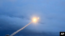 This video grab provided by RU-RTR Russian television via AP television, March 1, 2018, shows the launch of what President Vladimir Putin said is Russia's new nuclear-powered intercontinental cruise missile.