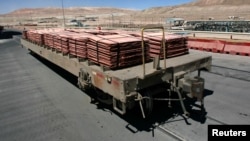 FILE - Sheets of copper cathode are pictured at BHP Billiton's Escondida, the world's biggest copper mine, in Antofagasta, northern Chile, March 31, 2008.
