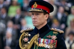 In this image released by Netflix, Tobias Menzies portrays Prince Philip in a scene from the third season of "The Crown." (Des Willie/Netflix via AP)