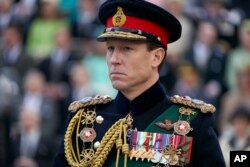 In this image released by Netflix, Tobias Menzies portrays Prince Philip in a scene from the third season of "The Crown." (Des Willie/Netflix via AP)