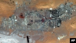 This October 8, 2012 satellite image provided by DigitalGlobe shows the Amenas Gas Field in Algeria, which is jointly operated by BP and Norway's Statoil and Algeria's Sonatrach.