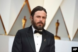 Casey Affleck arrives at the Oscars on Sunday, Feb. 26, 2017, at the Dolby Theatre in Los Angeles.