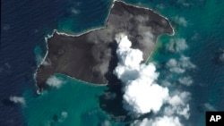 This satellite image provided by Maxar Technologies shows an overview of Hunga Tonga Hunga Ha'apai volcano in Tonga on Jan. 6, 2022, before a huge undersea volcanic eruption. (Satellite image ©2022 Maxar Technologies via AP, File)