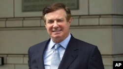 FILE - Paul Manafort, President Donald Trump's former campaign chairman, leaves the Federal District Court after a hearing, in Washington, May 23, 2018.