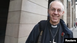 Justin Welby, the Bishop of Durham, walks through Westminster in London, November 8, 2012. 