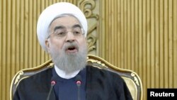 Iranian President Hassan Rouhani speaks after returning from the annual United Nations General Assembly, in Tehran, Iran, Sept. 29, 2015.