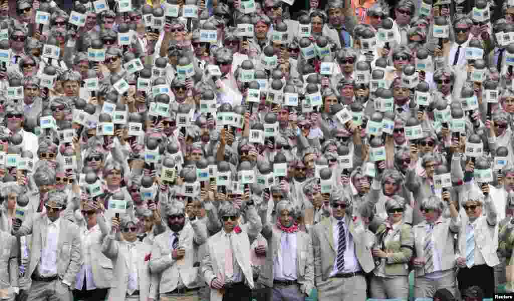 Fans dressed as the late cricket player and commentator Richie Benaud, paying tribute to him while watching the third cricket test between Australia and the West Indies at the SCG in Sydney.