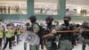 Riot police enter the shopping mall to disperse the protesters during the Labor Day in Hong Kong, May 1, 2020.