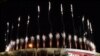 Fireworks go off around the Olympic Stadium during the closing ceremony of the Tokyo 2020 Olympic Games, as seen from outside the venue in Tokyo on August 8, 2021. (Photo by Kazuhiro NOGI / AFP)