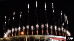 Fireworks go off around the Olympic Stadium during the closing ceremony of the Tokyo 2020 Olympic Games, as seen from outside the venue in Tokyo on August 8, 2021. (Photo by Kazuhiro NOGI / AFP)