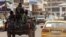 Central African soldiers patrol a street in Bangui, Central African Republic, January 7, 2013. 
