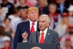 Louisiana Republican gubernatorial candidate Eddie Rispone speaks as he is endorsed by President Donald Trump at a campaign rally in Bossier City, La., Nov. 14, 2019.