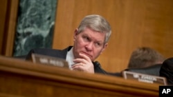 FILE - Senate Banking Committee Chairman, Sen. Tim Johnson (D-SD), on Capitol Hill, Washington, May 21, 2013.