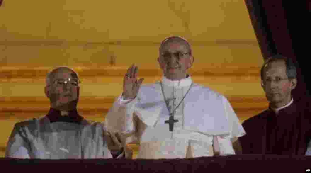 &quot;What I expect him to do most is, for us Africans, he has to support our rights&hellip; and he has to join us in the fight against gay and lesbian marriage. We as Africans &ndash; we can&rsquo;t support that.&quot; Zaituni Mahmoud, Gudele, Juba Pope Francis waves to the crowd from the central balcony of St. Peter&#39;s Basilica, the Vatican, March 13, 2013.