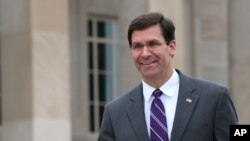 FILE - Acting U.S. Secretary for Defense Mark Esper speaks during a media conference at the conclusion of a meeting of NATO defense ministers at NATO headquarters in Brussels, Belgium, June 27, 2019.