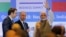 FILE - India's Prime Minister Narendra Modi waves as Russian President Vladimir Putin looks on after attending the India-Russia Business Summit in New Delhi, India, Oct. 5, 2018. 