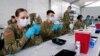 New US Military COVID Cases Lowest Since June as 1st Vaccine Deadlines Approach