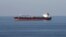 FILE - Oil tankers pass through the Strait of Hormuz, Dec. 21, 2018.