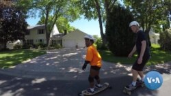 Daughter Learns Moves From Skateboarder Dad